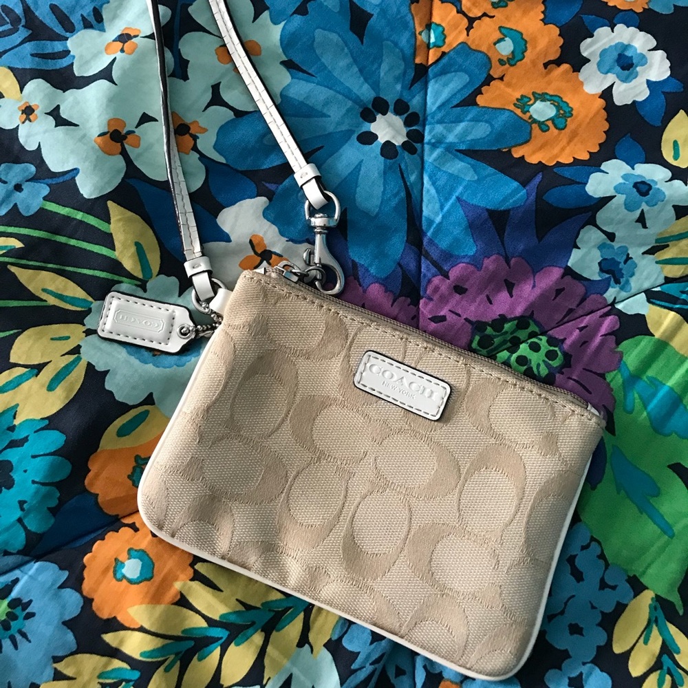 Coach white and beige fabric corner zip wristlet